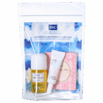 DHC KIT DE VOYAGE HUILE DEMAQUILLANTE 30ML BASE DE TEINT VELOUTEE 5G PAPIER MATIFIANT 100 FEUILLES